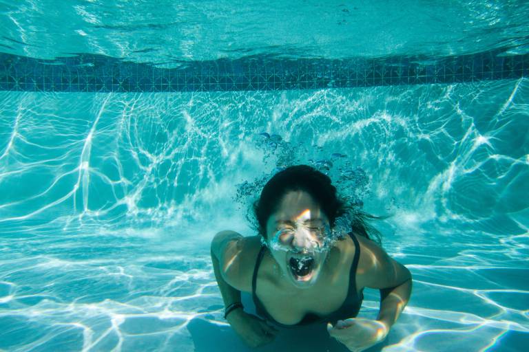 Lay water. Woman Drowning Bubbles. Underwater woman Chain.